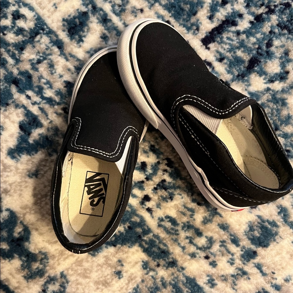 Size 9 toddler boy Vans purchased from the Vans store brand new!